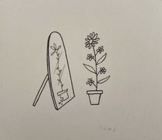 a drawing of a mirror and flower pot