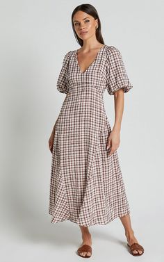 Jameela Midi Dress - V Neck Short Puff Sleeve Godet A Line Smock Dress in Chocolate Gingham | Showpo USA Fitted V-neck Midi Dress For Picnic, Fitted Gingham Plaid Dress With V-neck, V-neck Midi Dress With Gathered Sleeves For Day Out, Fitted V-neck Plaid Dress For Spring, Chic V-neck Dresses For Picnic, Spring V-neck Midi Dress For Picnic, V-neck Midi Dress For Spring Picnic, Gingham Short Sleeve Dress For Daywear, Elegant Puff Sleeve Dress With Smocked Bodice And V-neck