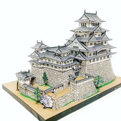 an architectural model of a castle on display