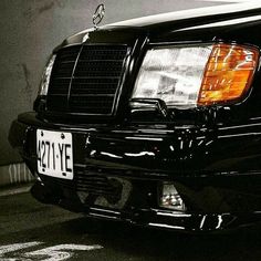 the front end of a black mercedes benz