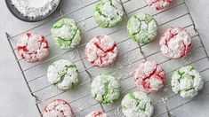 powdered sugar cookies cooling on a wire rack