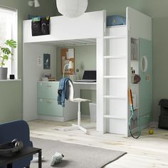 a loft bed with a desk and chair in the corner, next to a window