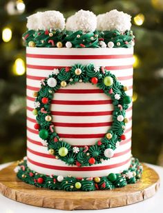 a christmas cake decorated with green and red stripes