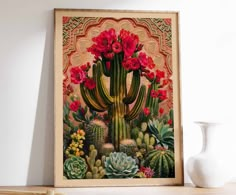 a cactus with red flowers in front of a white vase on a shelf next to a wall