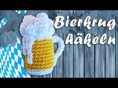 a crocheted mug is shown with the words bierling akkenn