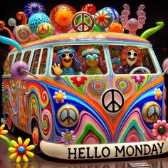 a vw bus decorated with flowers and peace signs