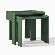 two green tables sitting next to each other