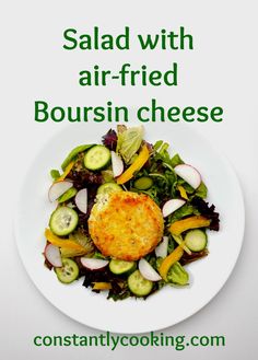 salad with air fried boursin cheese on a white plate