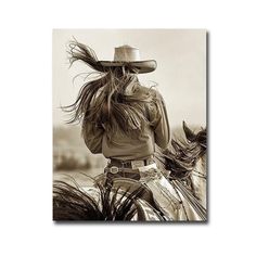 a black and white photo of a woman riding a horse with her hair blowing in the wind