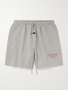 Fear of God Essentials makes comfortable basics with a streetwear feel. These shorts are made from cotton-blend jersey and stamped with the new 'Fear of God State' logo in red ink above the hem. The extra-long drawstring is a signature of the brand's. Essential Fear Of God, Fear Of God Sweatpants, Fear Of God Shorts, Cotton Activewear With Built-in Shorts For Streetwear, Essentials Fear Of God, Fear Of God Essentials, Shorts For Men, Fear Of God, Red Ink