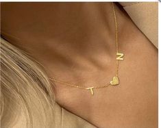 "Personalized 1-6 initials Necklace - names jewelry We make the necklace specially for you with the initials of your kids    Please offer the initials to us. We'll produce according to your requirement!! Choose length at checkout. Need a different length? No problem - just let me know in the \"notes to seller\" at checkout. We make our gold name necklaces from highest grade 18k gold plated over sterling silver - This necklace can also be made in sterling silver or rose gold. The necklace will be sent gift-wrapped and packed in a padded envelope to maintain the product Matching name earrings: https://www.etsy.com/il-en/listing/245252778/personalized-earrings-fashion-earrings?ref=shop_home_active_5 Thank you for your interest. Please check out our other items and be sure to add us to your fa Names Jewelry, Personalized Earrings, Initials Necklace, Mother Necklace, Name Necklaces, Name Earrings, Kids Names