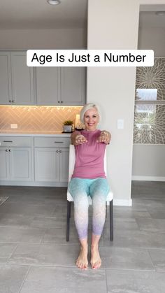 an older woman sitting in a chair with her legs crossed and the caption age is just a number