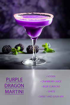 a purple dragon martini with blackberries on the rim and garnished in sugar