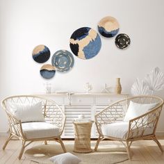 a living room filled with furniture and plates on the wall