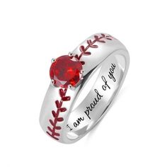 a baseball ring with the words i am proud of you on it and a heart shaped red