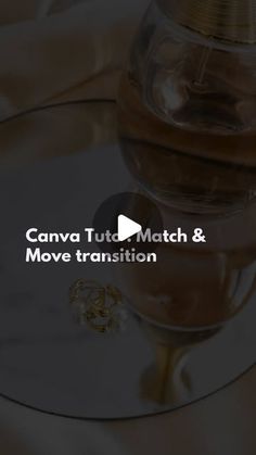 the canva tutto match and move transition logo on a glass table with gold cloth