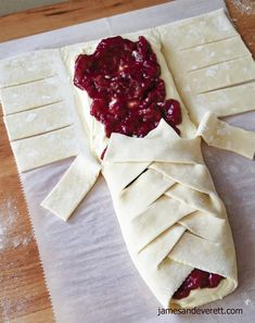 homemade crepe with fruit filling and rolled out dough