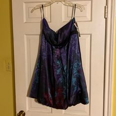 Never Worn! Original Tags Still On. Satiny Feel, Empires Waist. Beautiful Jewel Tone Blacks, Aquas, Purples, And Burgundy. Size 13-14. Ptp - 18” Length - 29” Original Price $119 Purple Strapless Dress With Sweetheart Neckline For Evening, Purple Strapless Dress With Sweetheart Neckline, Purple Strapless Cocktail Dress, Purple Sleeveless Mini Dress For Evening, Spring Purple Strapless Mini Dress, Spring Purple Mini Strapless Dress, Purple Mini Dress With Sweetheart Neckline For Party, Purple Strapless Mini Dress For Cocktail, Purple Mini Length Strapless Dress For Cocktail