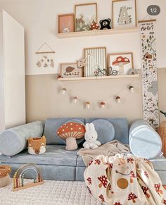 a living room filled with lots of furniture and decor on top of a wooden shelf