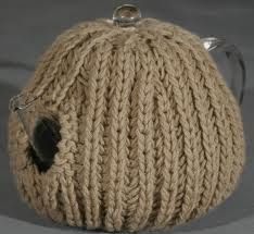 a knitted ball with a metal handle