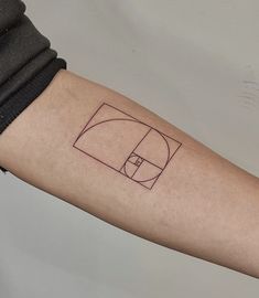 a person with a tattoo on their arm that has a basketball court in the middle