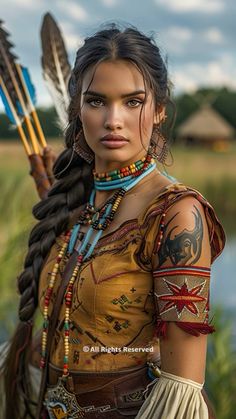 a woman dressed in native american clothing holding two arrows and looking at the camera with an intense look on her face