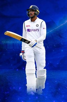 a man in white uniform holding a cricket bat