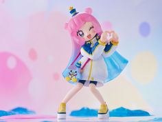 a figurine is posed in front of a blue and pink background