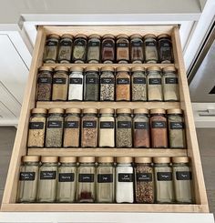 an organized spice rack in a kitchen