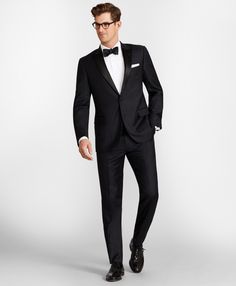 This iconic 1818 tuxedo is crafted from the world's finest fabrics, woven in Italy. Elements of fine construction can be found in each suit, from hand tailoring in the arm openings for comfort, to the traditional Italian-made internal canvas that creates the perfect lapel roll and a customized fit. Our elegant tuxedo is impeccably tailored in pure wool twill woven in Italy by Vitale Barberis Canonico. One-button silhouette with peak satin lapels, flap pockets and side vents. Half lined, Regent f Vegas Groom, Hot Pink Candles, Tux Prom, Color Bridesmaid Dresses, Black Wedding Theme, Prom Fits, Blue Tux, Prewedding Photo, Groom's Suit