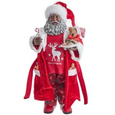 a santa clause holding a plate of food