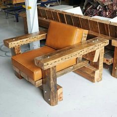 two benches made out of wooden planks and one bench made from wood pallets