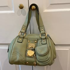 Soft Leather Bawling Bag. Approximately 11 X 8 X 7. New W Tags. See Pictures For Details. Small Hardly Visible Mark On Handle. Kate Spade Green Bag, Green Juicy Couture Bag, Green Shoulder Bag With Double Handle And Palladium Hardware, Green Shoulder Bag With Palladium Hardware And Double Handle, Designer Green Satchel With Palladium Hardware, Green Tote Shoulder Bag With Palladium Hardware, Designer Green Satchel With Branded Hardware, Luxury Green Bags With Metal Hardware, Thrift Purses