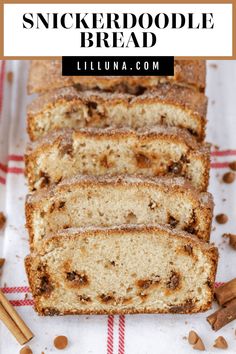 sliced cinnamon swirl quick bread on a red and white checkered table cloth with cinnamon sticks