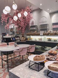 a bakery filled with lots of cakes and pastries