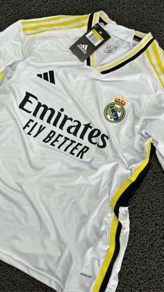 the jersey worn by real madrid is displayed on the floor