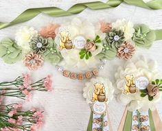 some paper flowers and ribbons on a table