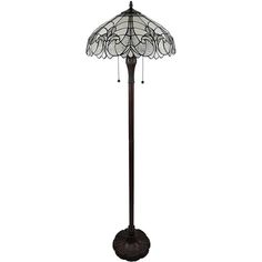 a floor lamp with a stained glass shade on the top and bottom part of it