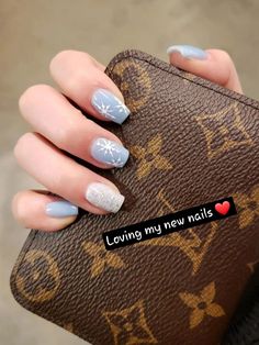 Cute Christmas Nails To Recreate This Holiday Season | Winter Nails 2023 Light Blue Winter Nails, Nails With Snowflakes, Blue Winter Nails, Acrylic Nails Winter, Winter Nails 2023, Blue Christmas Nails, Nail Art Noel, Sky Blue Nails, Snow Nails