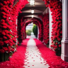 a long hallway with red flowers on the walls