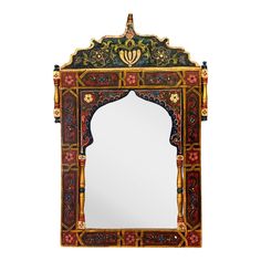 an ornately decorated mirror is shown against a white background