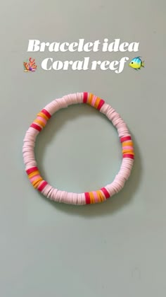 the bracelet is made with pink, orange and yellow beads on a gray background that says bracelet idea coral reef