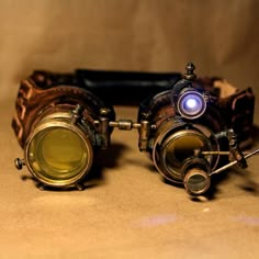 The physical embodiment of the symbiosis of several goggles in a new work. The "Naos" goggles carry not only the legacy of their predecessors, but also a small lantern with a particle of light from the star of the same name, which is one of the most powerful stars in the Milky Way. Vegetable tanned leather, hand-painted, movable and adjustable nose bridge for any type of face, comfortable straps, soft eyepiece trim. Hand-sewn parts. Rotating mini-flashlight with bright LED and easy to turn on. Here is an item from the world of steampunk, which can not be bought in stores. Do not miss the chance to become the owner of a unique accessory that has no analogues in the world. I do not use plastic, but only authentic materials and technologies of the Victorian era - brass, glass and vegetable ta Type Of Face, Alice In Wonderland Room, Steampunk Goggles, Mini Flashlights, Small Lanterns, Steampunk Diy, Cool Glasses, Steampunk Accessories, The Milky Way