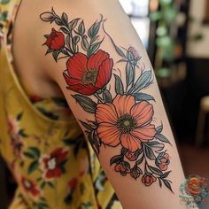 a woman with a flower tattoo on her arm