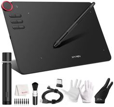 an image of a tablet with accessories and pen on it, including gloves, pens, markers