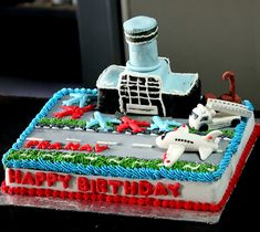 a birthday cake that is shaped like a boat