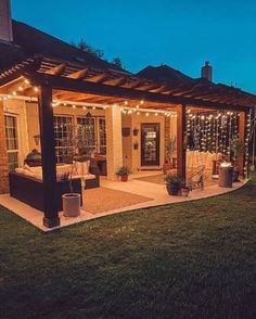 an outdoor patio with lights on it