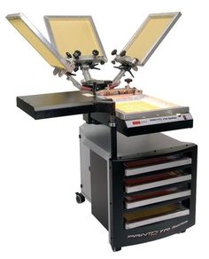 an image of a machine that is sitting on top of a table with many drawers