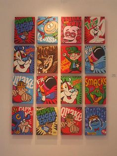 a group of cartoon pictures hanging on the wall