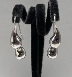 Beautiful Vintage Vintage Art Deco Signed 999 with Lotus Sterling Silver Double Teardrop Drop Earrings good pre/owned condition measures 1 1/8" Silver Teardrop Earrings, Art Deco Sign, Vintage Art Deco, Teardrop Earrings, Lotus, Vintage Art, Jewelry Earrings Dangle, Etsy Earrings, Dangle Drop Earrings